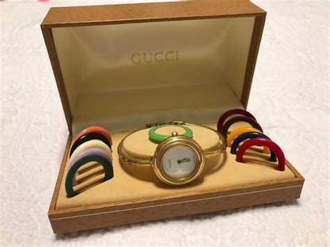 vintage gucci watch interchangeable face|Gucci watch with changeable face.